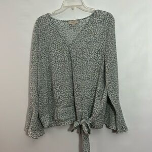 Blouse from Loft. White background with blue yellow and green flowers